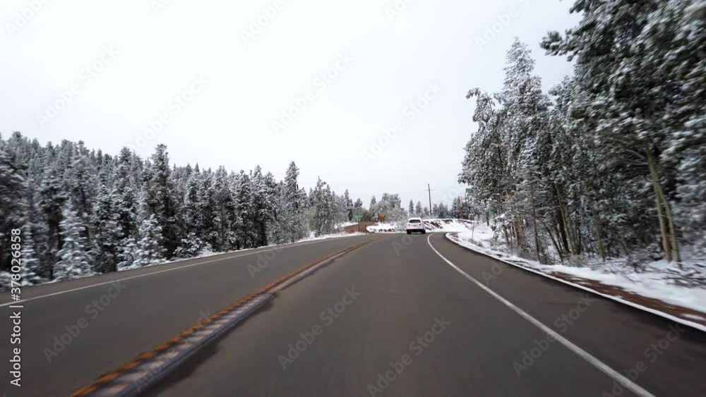 POV driving in the Rocky Mountains of Colorado after an early snow storm in September POV driving in the Rocky Mountains of Colorado after an early snow storm in September