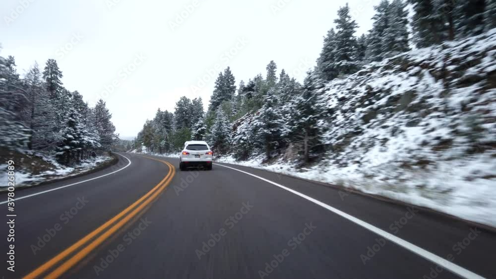 POV driving in the Rocky Mountains of Colorado after an early snow storm in September POV driving in the Rocky Mountains of Colorado after an early snow storm in September