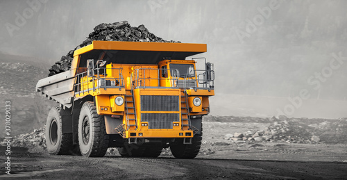 Valokuvatapetti Open pit mine industry, big yellow mining truck for coal anthracite
