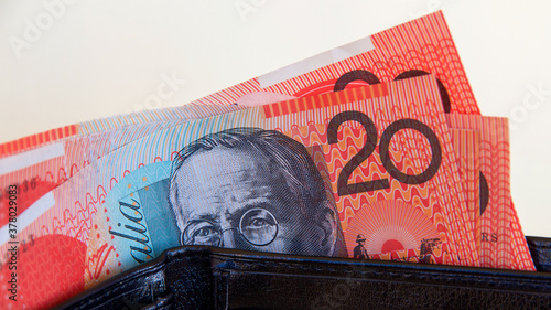 Australian dollars in a black leather wallet.
