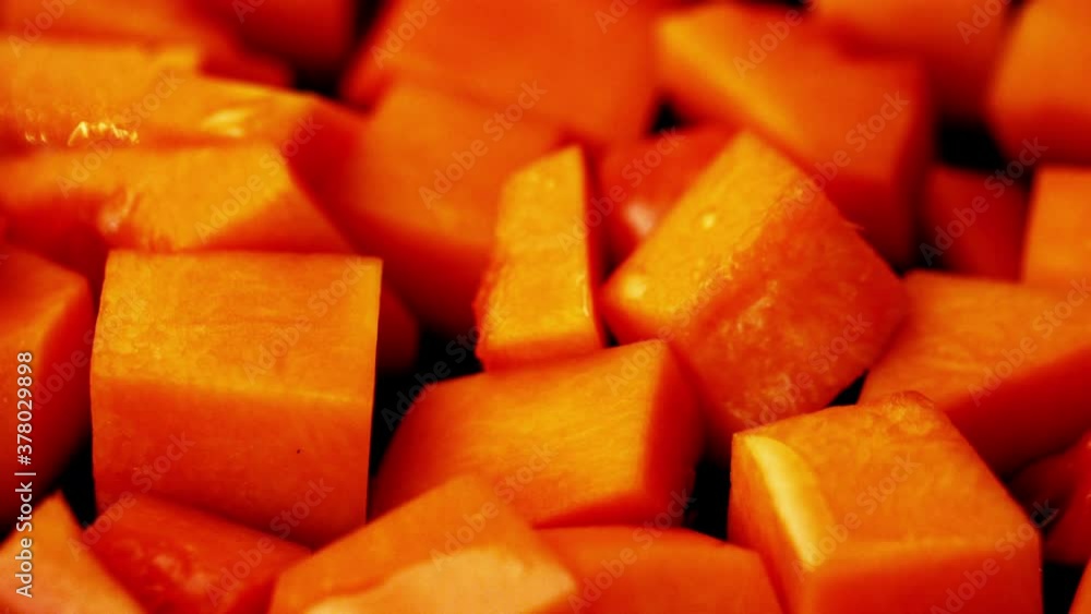 Adding Thyme to Butternut Squash in a pan Adding Thyme to Butternut Squash in a pan