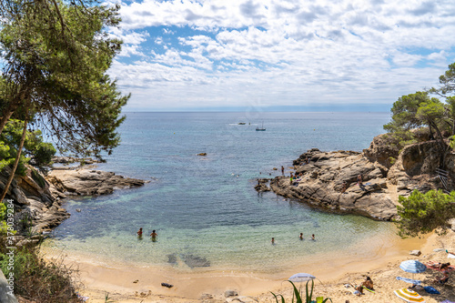 Sa cova cove at summer in Platja d´Aro beach. photo