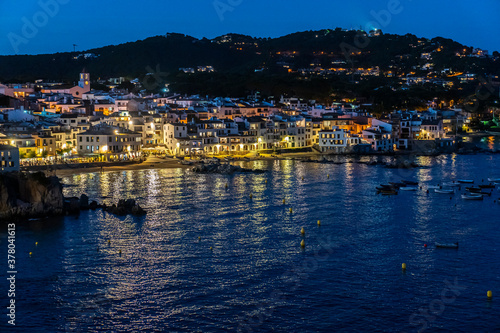 Views of the town of "Calella de Palafrugell" at night.