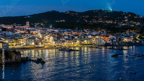 Views of the town of "Calella de Palafrugell" at night.