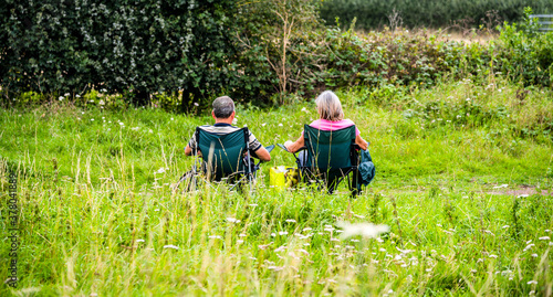 Couple sitting - The Greenway Cycle and Walking Track Nr. Stratford upon Avon Warwickshire English Midlands England UK. © david hughes
