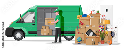 Delivery van with open door and home stuff. Moving to new house. Family relocated to new home. Boxes with goods. Package transportation. Computer, lamp, clothes, books. Flat vector illustration