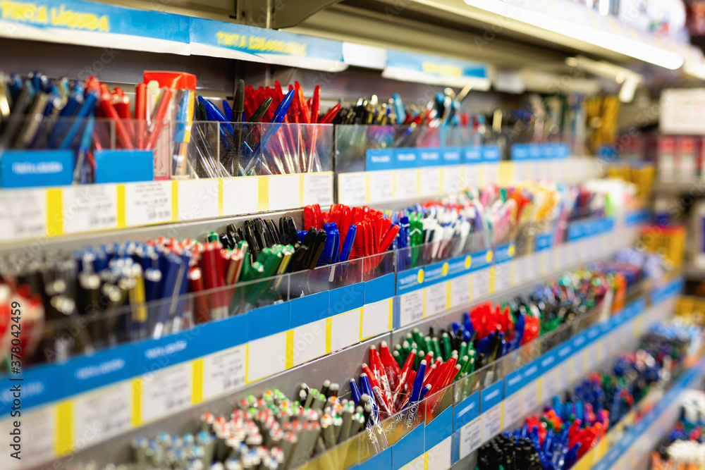 Colorful bright quality pen shelves in office supply store