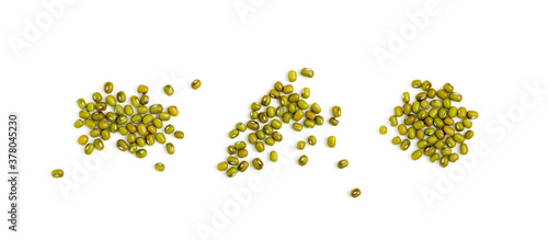 Dry raw mung beans or vigna radiata seeds isolated on white photo