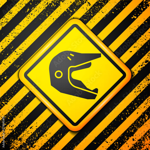 Black Motocross motorcycle helmet icon isolated on yellow background. Warning sign. Vector Illustration.