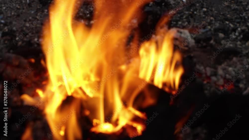 There is a fire in the defocusing. Flames of bright orange and red burst forth with force. Red-hot forge forge. Ancient handcraft. Preparation for professional work. 4K video. There is a fire in the defocusing. Flames of bright orange and red burst forth with force. Red-hot forge forge. Ancient handcraft. Preparation for professional work. 4K video.