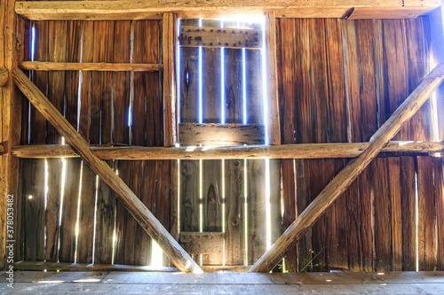 Obraz na płótnie Old Rustic Barn Interior, Sunlight
