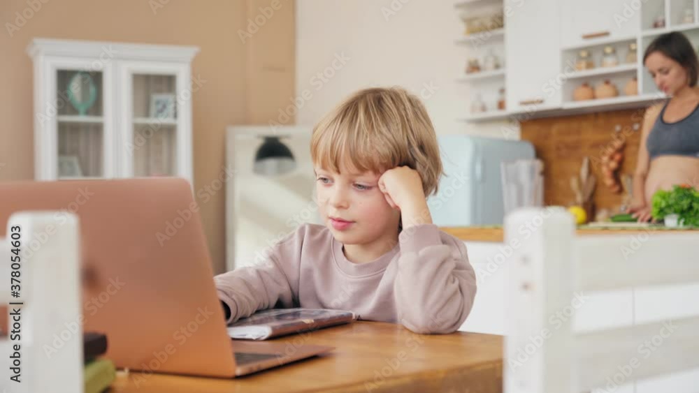 Video Call. Distance Education. Schoolboy Video Call Via Laptop. Talking With Kid Video Calling Using Computer. Home Conference Children Education Video Call. Distance Education. Schoolboy Video Call Via Laptop. Talking With Kid Video Calling Using Computer. Home Conference Children Education