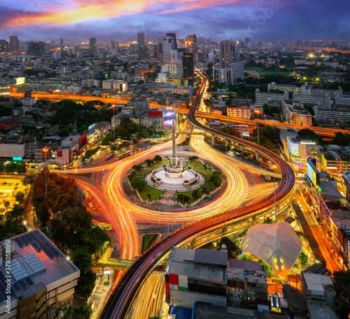 Victory monument Thailand in Bangkok city with sunset and building background