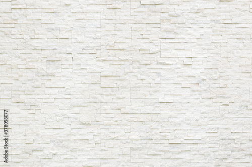 background and texture of modern style of white decorative real stone wall  surface