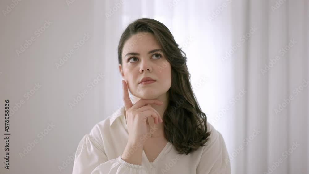 European woman thinking. Thoughtful expression. European pretty woman. European woman thinking. Thoughtful expression. European pretty woman.