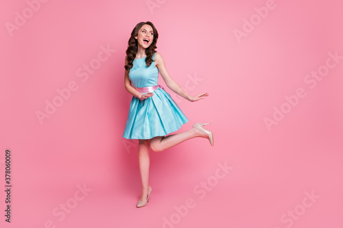 Full length body size view of her she nice-looking attractive lovely pretty fashionable charming cheerful cheery carefree wavy-haired girl having fun dancing isolated over pink pastel color background