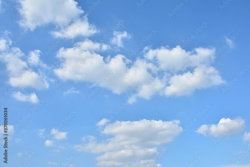  Blue Sky With Scattered Clouds With A Sun 
