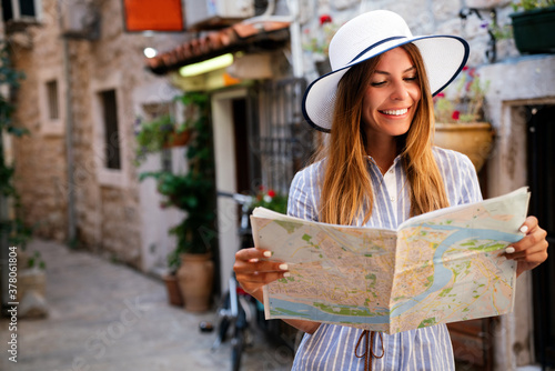 Beautiful happy woman, student enjoying travel and summer vacation