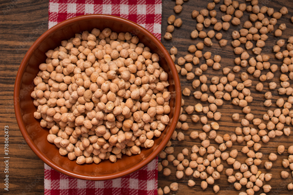 organic chickpeas legumes in bowl and red napkin