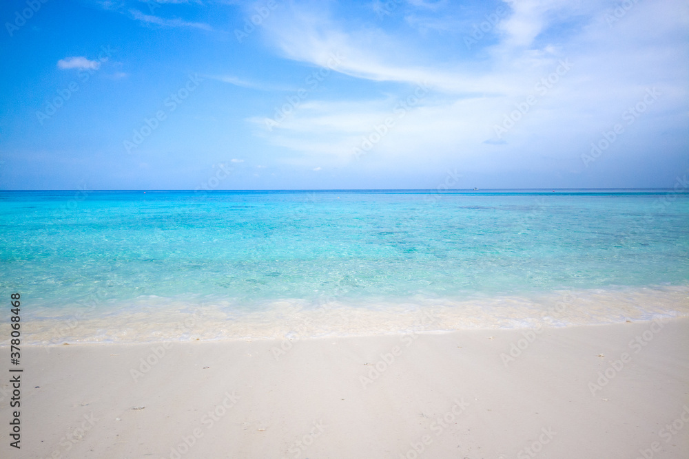 Clear sea water can see the sandy beach in Racha Island, Phuket, Thailand.