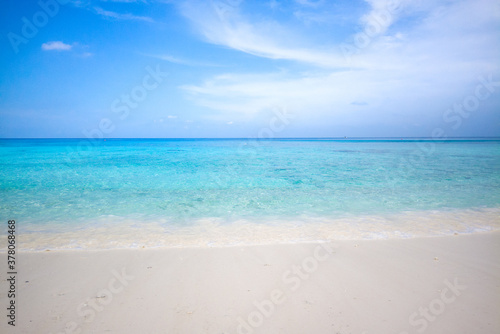Clear sea water can see the sandy beach in Racha Island, Phuket, Thailand. © satit