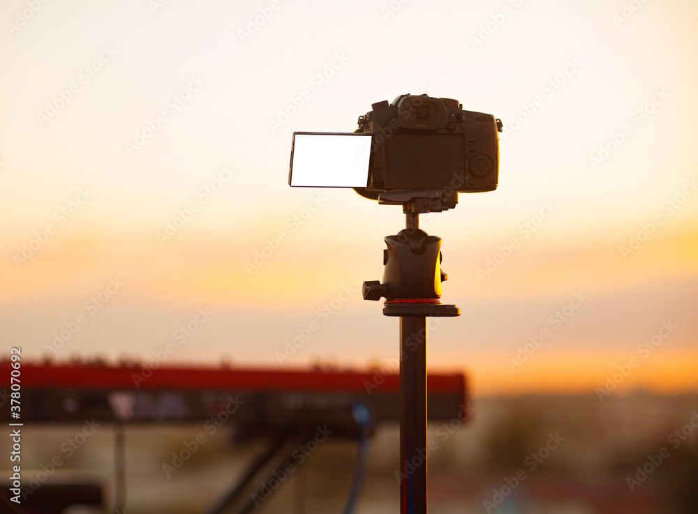 Photo of camera with empty blank screen filming live concert outdoor Photo of camera with empty blank screen filming live concert outdoor