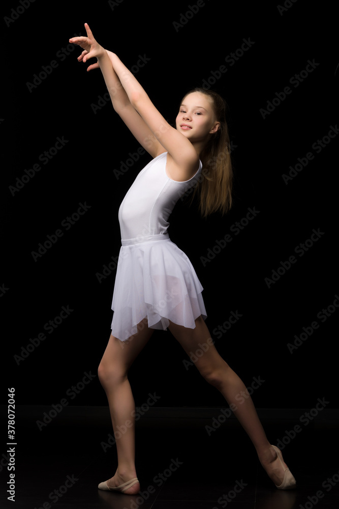 Full length portrait of a charming gymnast girl in elegant dress. Full length portrait of a charming gymnast girl in elegant dress.