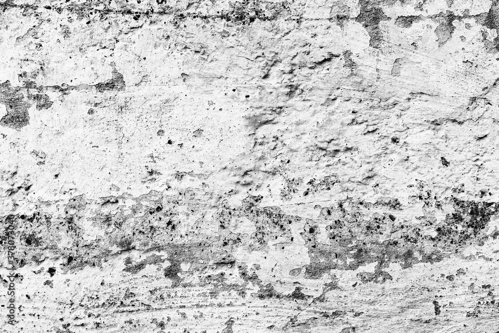 Fototapeta premium Texture of a concrete wall with cracks and scratches which can be used as a background