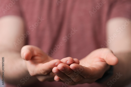 A man holding empty his hand