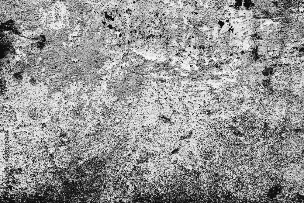 Fototapeta premium Texture of a concrete wall with cracks and scratches which can be used as a background