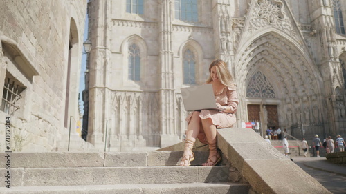 Photography Pretty woman working laptop outdoor