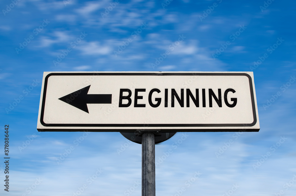 Beginning road sign, arrow on blue sky background. One way blank road sign with copy space. Arrow on a pole pointing in one direction. Beginning road sign, arrow on blue sky background. One way blank road sign with copy space. Arrow on a pole pointing in one direction.