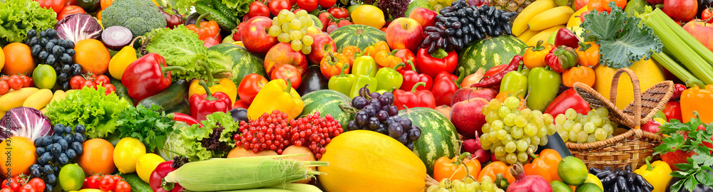 Large fruit colorful wide background of healthy vegetables and fruits.