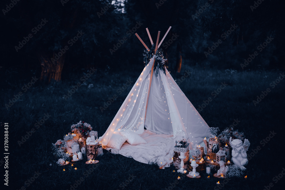 white air tent for a romantic evening. wedding night decor, candles, angel - obrazy, fototapety, plakaty 