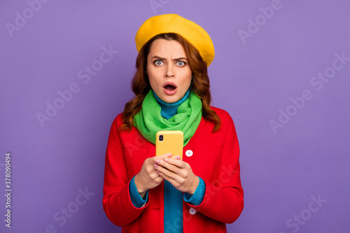 Close-up portrait of her she nice-looking attractive lovely pretty charming outraged disappointed wavy-haired girl using digital cell browsing isolated over violet lilac purple pastel color background