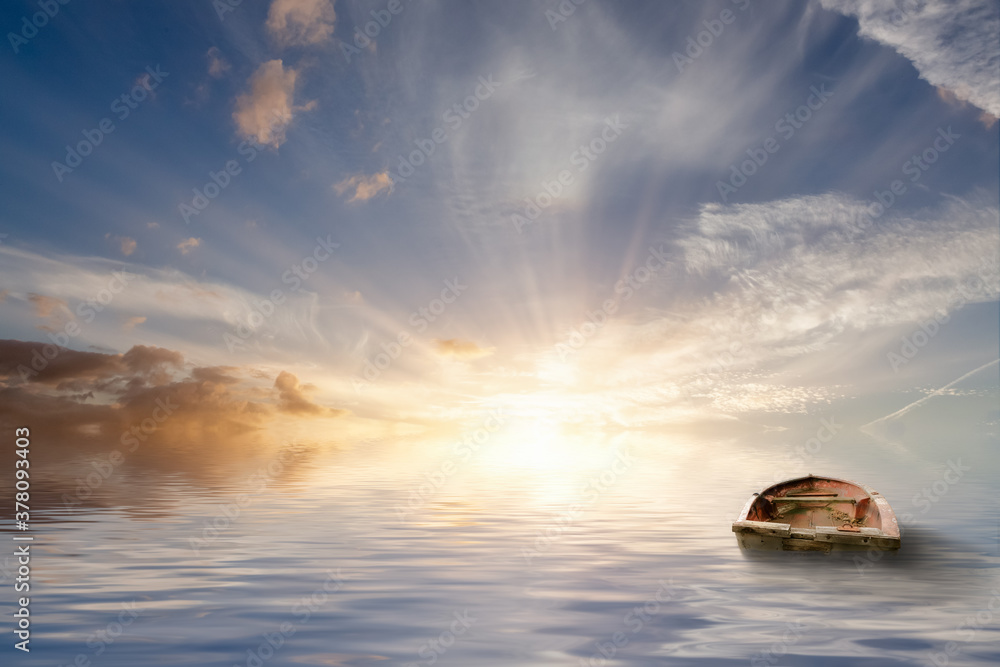 Old rowing boat adrift at sea Old rowing boat adrift at sea