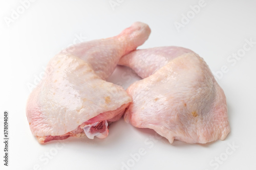 Trimmed chicken legs on a white background