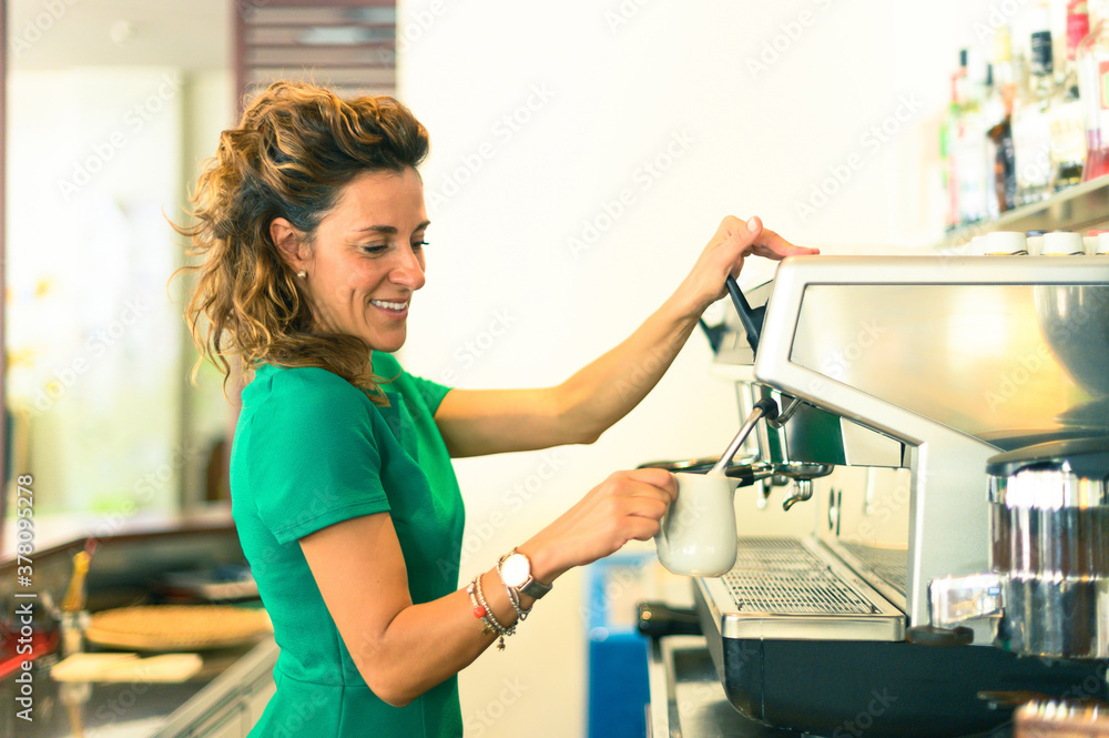 Barman lady, preparing coffee drink with espresso machine in shop cafe Barman lady, preparing coffee drink with espresso machine in shop cafe