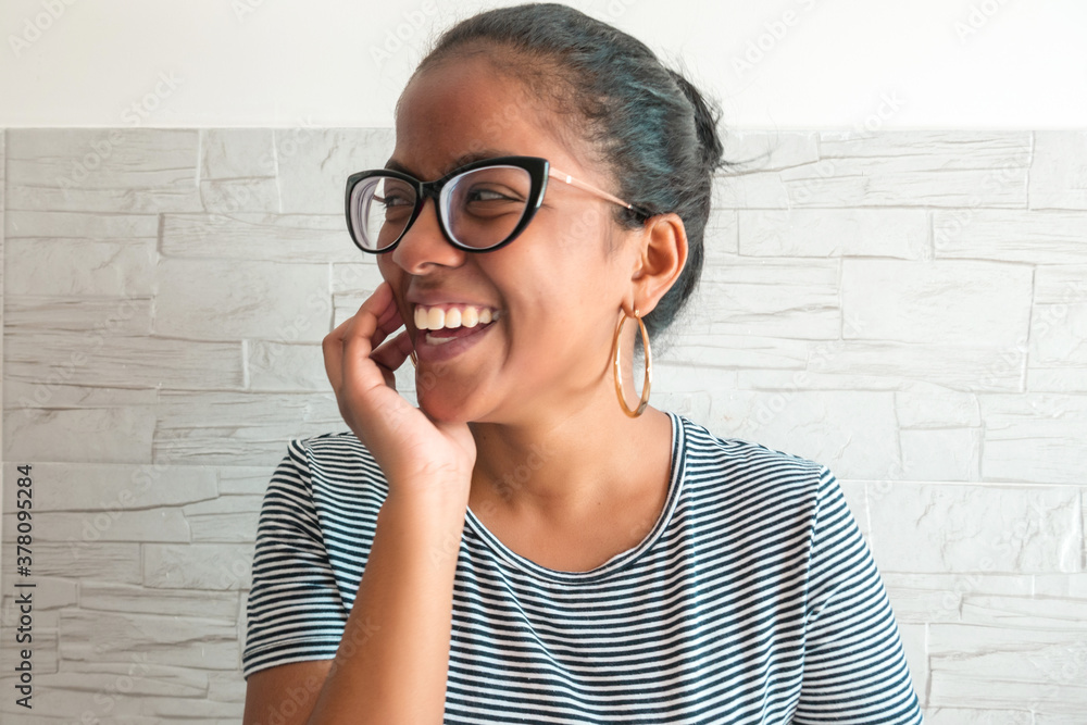 Portrait Of A Pretty African American Woman Posing Near A Window Portrait Of A Pretty African American Woman Posing Near A Window