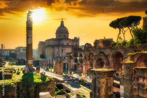 Photography Amazing ruins of the Roman Forum at sunset, Rome. Italy