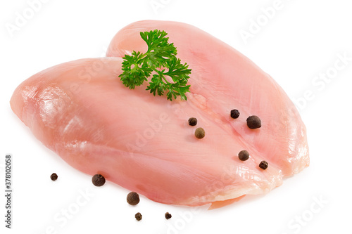 Raw chicken fillet with parsley and peppercorns isolated on white background