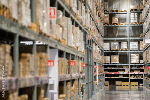 Background of warehouse or storehouse industrial and logistic company.Warehousing on the floor and called the high shelves