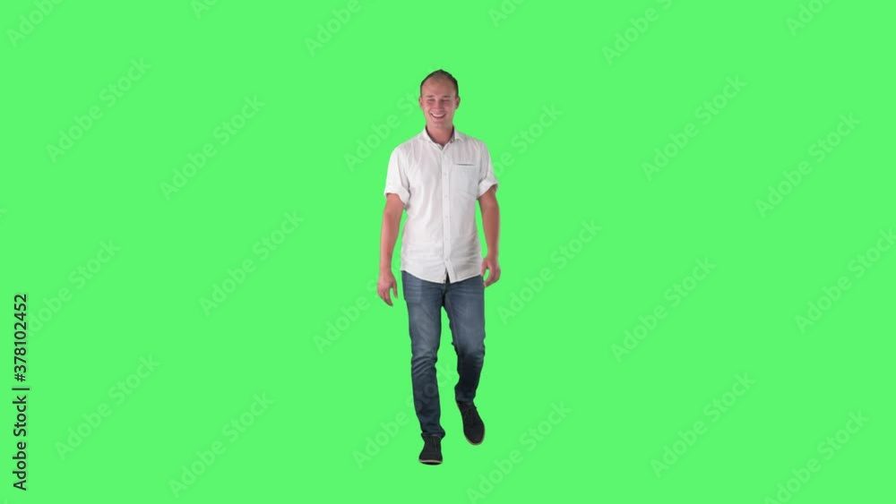 Confused and amazed business man looking around while walking. Full body on green screen. Confused and amazed business man looking around while walking. Full body on green screen.