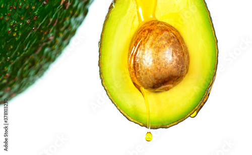 Fresh cut avocado with oil ...