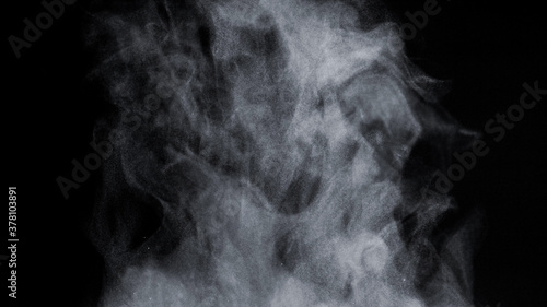 White Steam Ascends from Glass Pot, close-up.