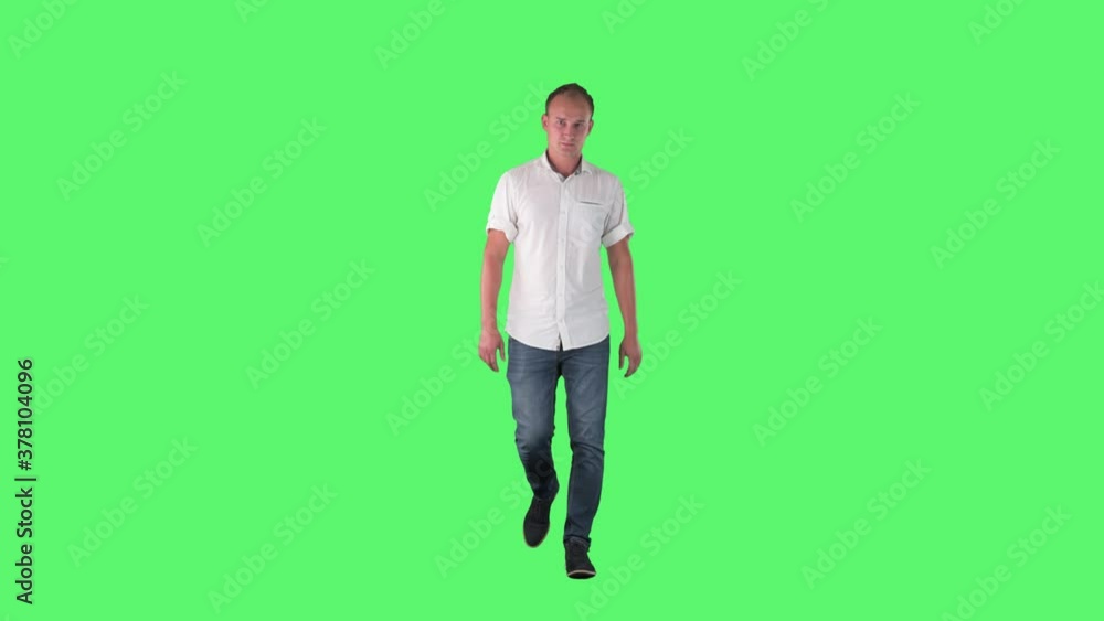 Displeased adult smart casual business man walking solving problems. Full body on green screen. Displeased adult smart casual business man walking solving problems. Full body on green screen.