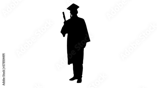 Silhouette Happy male student in graduation robe posing and waiv