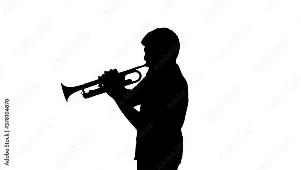 Naklejka premium Silhouette Young musician playing the trumpet.