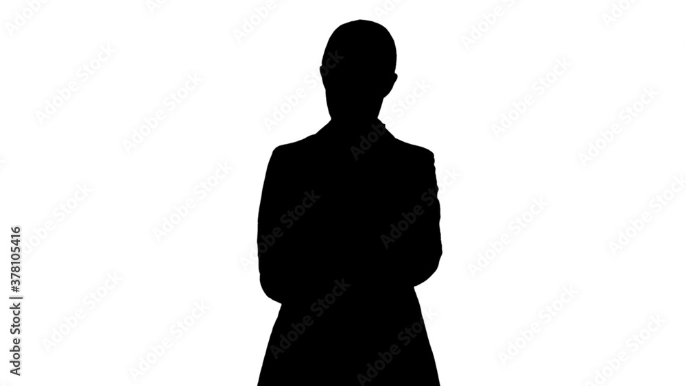 Silhouette Disapprovingly looking business woman using her phone