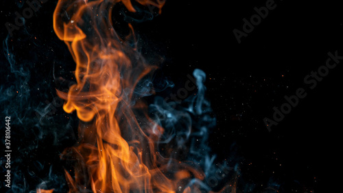 fire flames with sparks on a black background, close-up